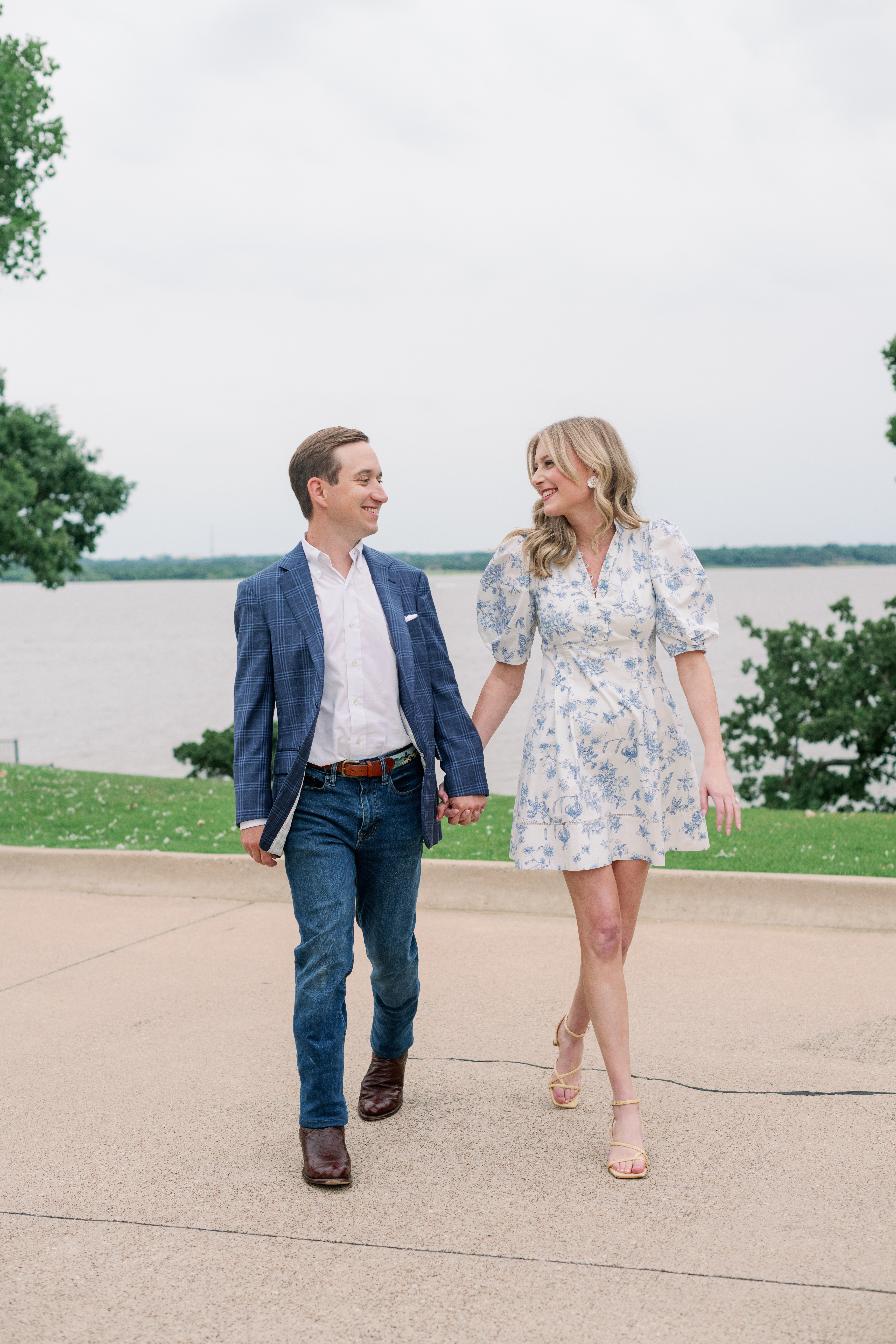 Newly engaged couple walking